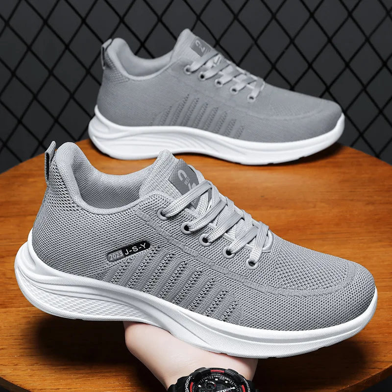 Men's shoes spring new trend men's shoes breathable lace-up running shoes Korean version of light casual walking shoes